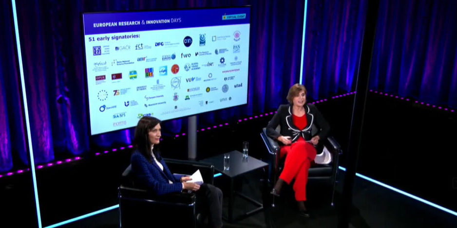 picture of Mariya Gabriel (Commissioner for Innovation, Research, Culture, Education and Youth) and Anna Panagopoulou (Director of European Research Area & Innovation in the European Commission) in front of the logos of the 51 early signatories